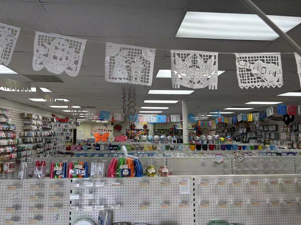 Inside Sonice Party wholesale showroom with party decorations balloons and tableware